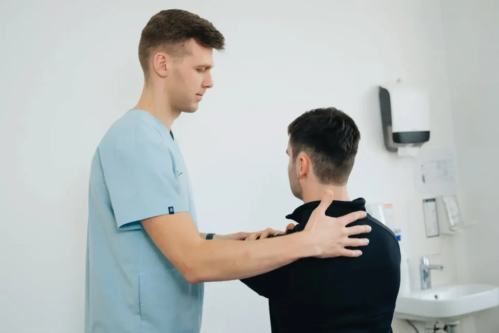 image of a health care professional checking your back posture